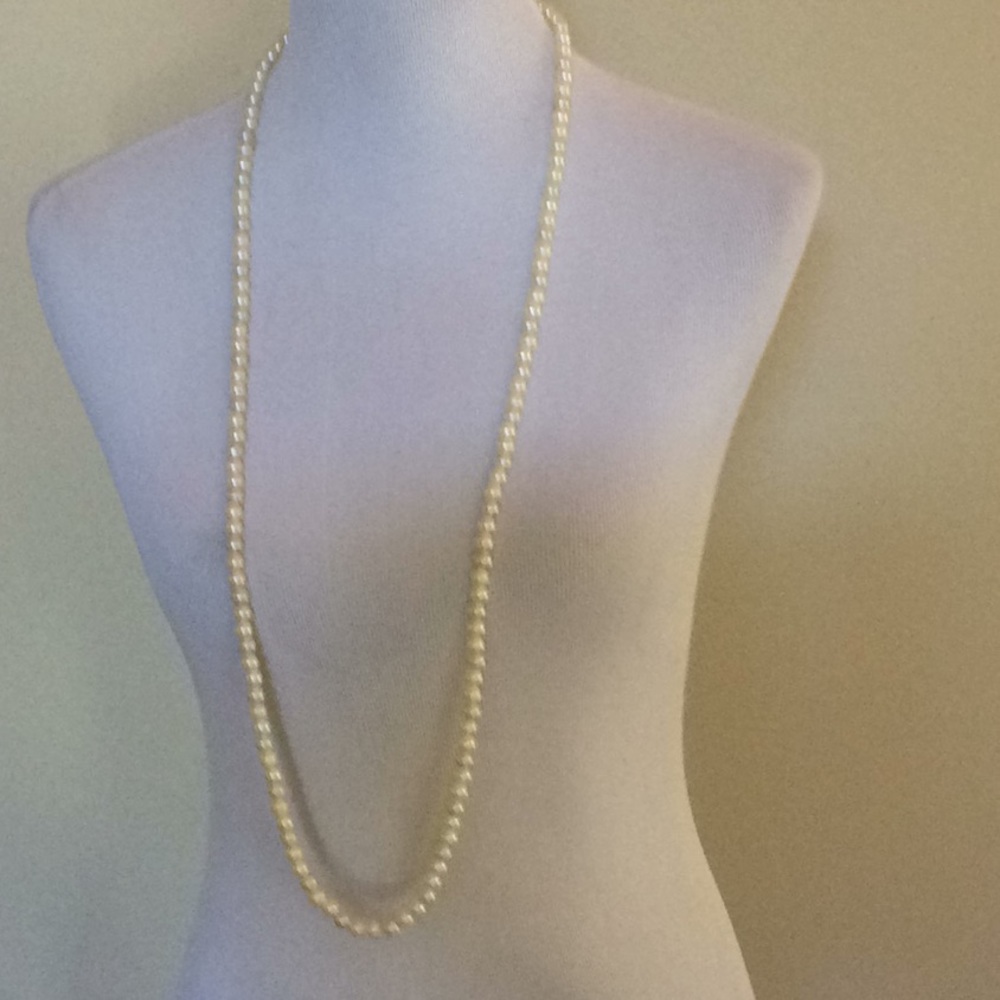 Vintage pearlized beads 20” drop.